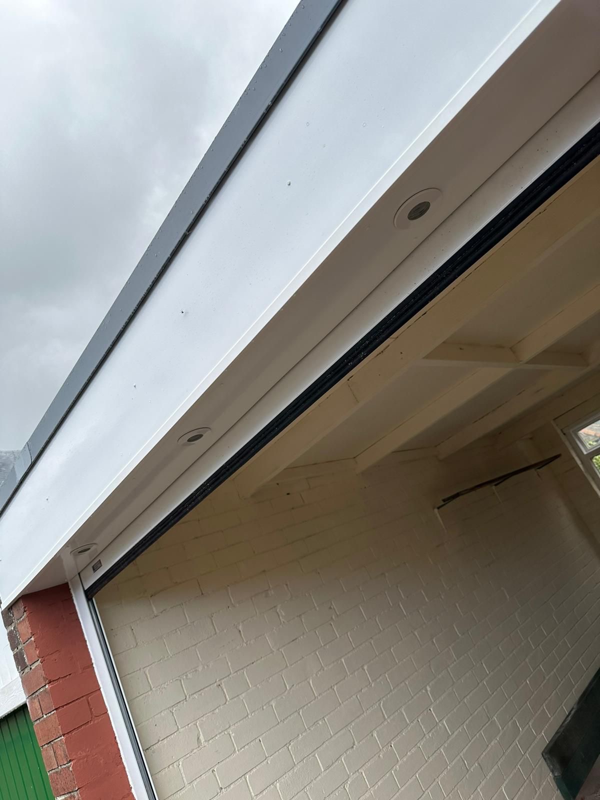 Soffit-mounted exterior downlights